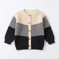 Cream grey and black button-front knit cardigan laid flat on white