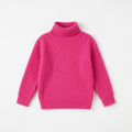Girls fuchsia knitted turtleneck sweater laid flat on a white background