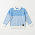 Boys light blue striped sweater with white shirt collar laid flat on white